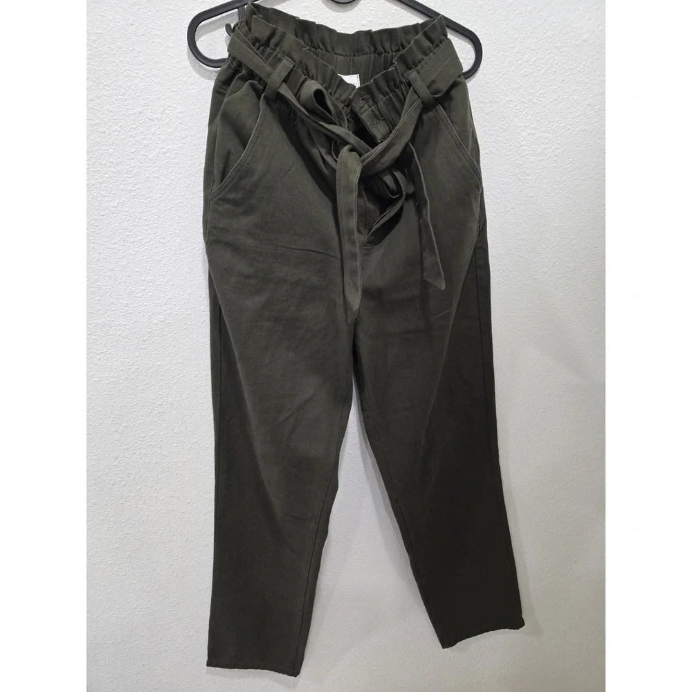 Rebels & Lovers casual pants featuring a flattering paperbag high-rise waist....